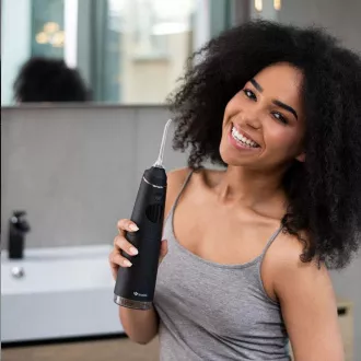 Duș oral TrueLife AquaFloss Compact C300 negru pentru duș oral Duș oral TrueLife AquaFloss Compact C300 negru pentru duș oral